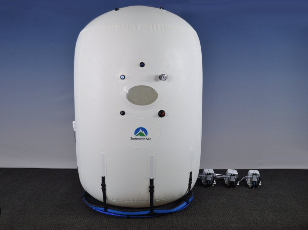 Summit to Sea upright mild hyperbaric oxygen chamber, front view with viewing window